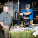 SilverFire vendor specializing in off-grid stoves, “biomass grills” and solar cookers at PrepperCon. Photo: Russel Daniels for Gizmodo